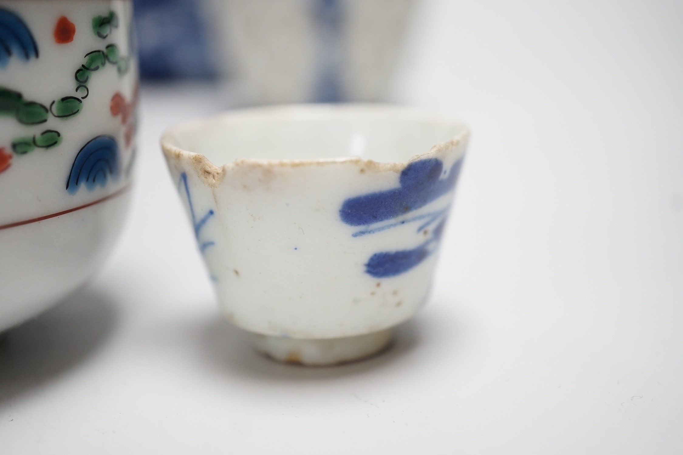 A group of mixed Chinese and Japanese porcelain vessels, tallest 11 cm